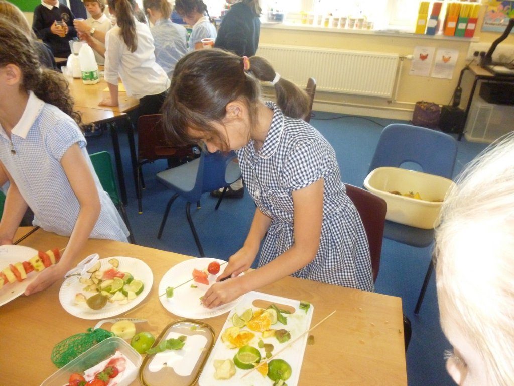 Making fruit kebabs